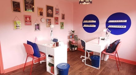 Chic nail salon interior at The Painted Parlour in Holmfirth, England, GB with stylish decor and manicure stations.