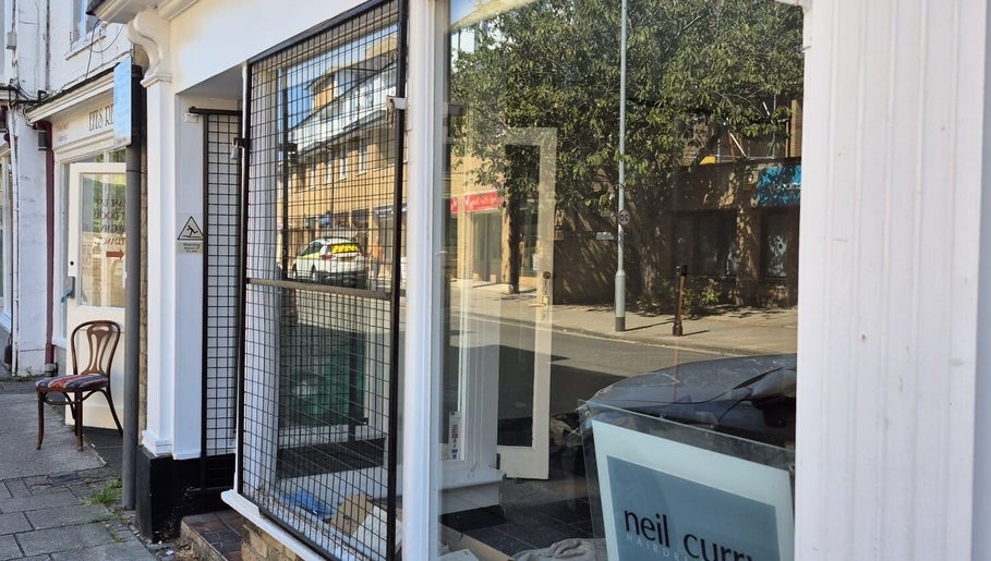 Exterior view of Neil Curry Hairdressing Ltd in Cambridge, England, GB, highlighting the salon’s inviting facade.