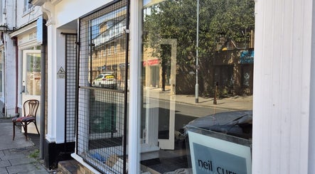 Exterior view of Neil Curry Hairdressing Ltd in Cambridge, England, GB, highlighting the salon’s inviting facade.