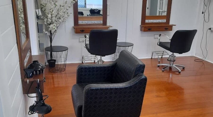 Modern salon chairs at Sadie's Hair Shed in Beaudesert, Queensland, AU offer a serene hair styling experience.
