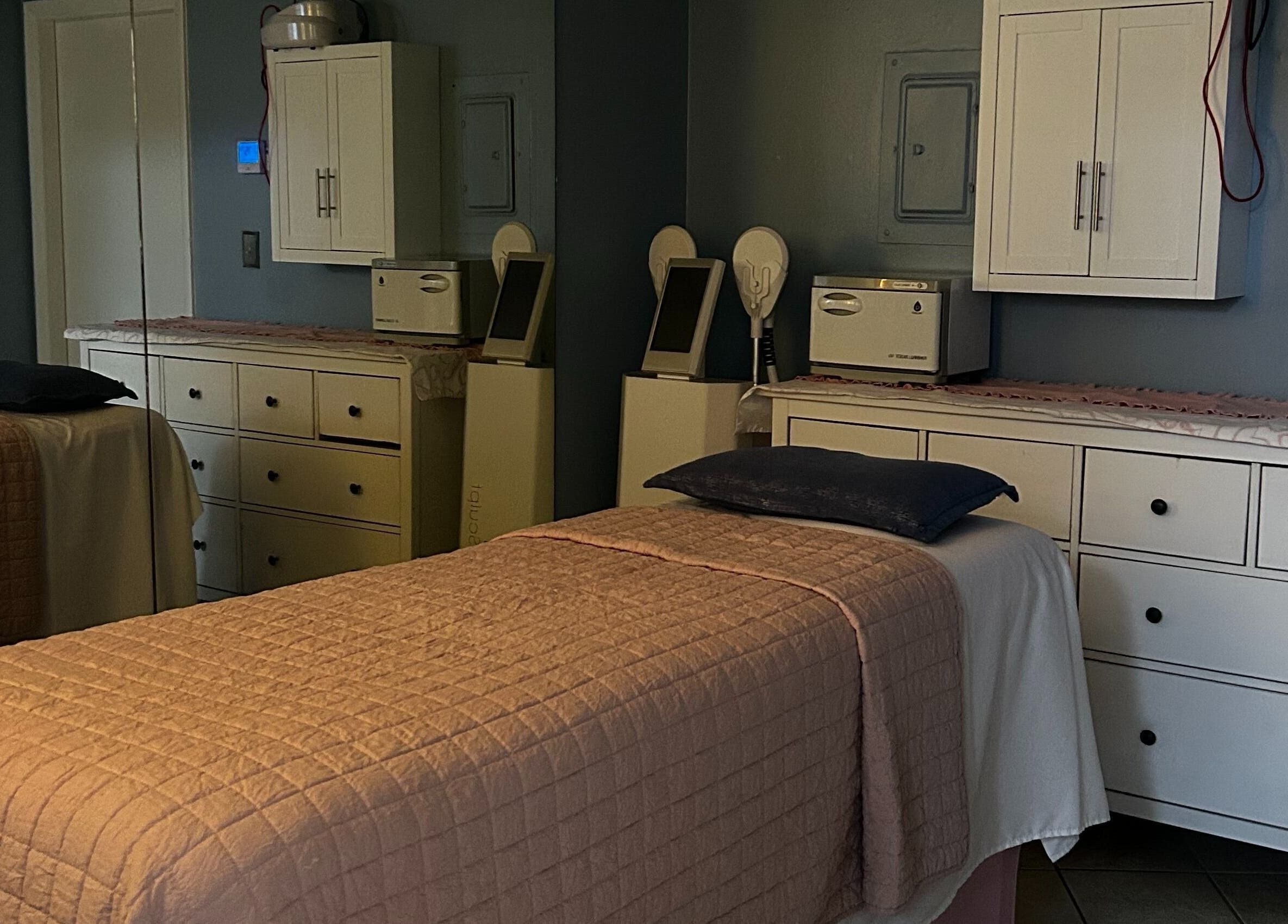 Calming treatment room at Bio Beauty Skincare and Wax Center in Gainesville, Florida, US with comfortable beds.