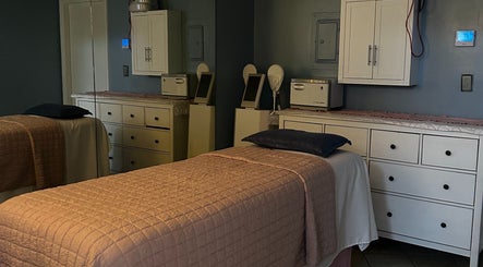 Calming treatment room at Bio Beauty Skincare and Wax Center in Gainesville, Florida, US with comfortable beds.