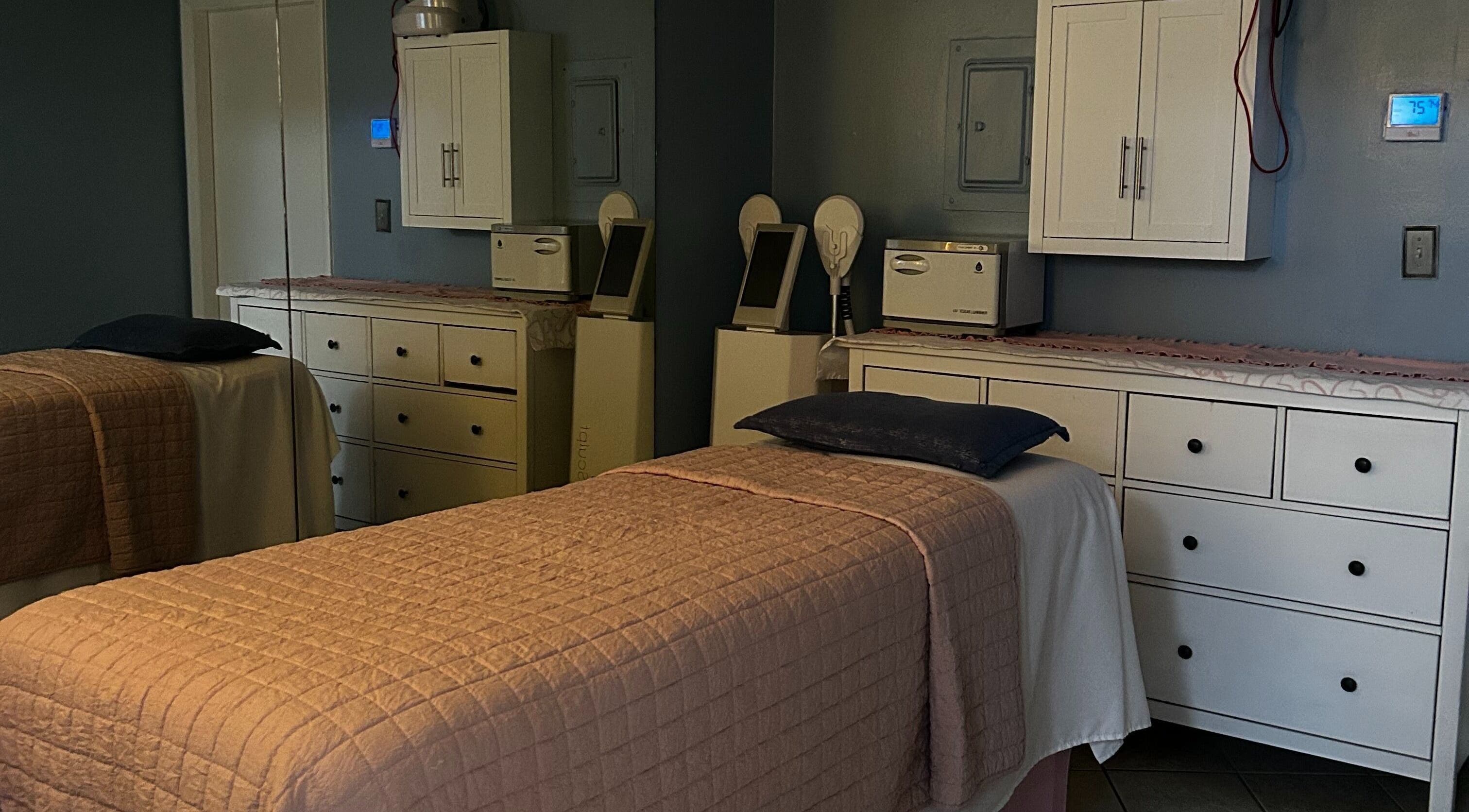 Calming treatment room at Bio Beauty Skincare and Wax Center in Gainesville, Florida, US with comfortable beds.