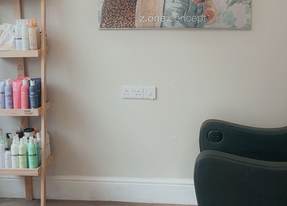 Shelved beauty products at The Hive Beauty, Holistics & Hair in Cullompton, England, GB.