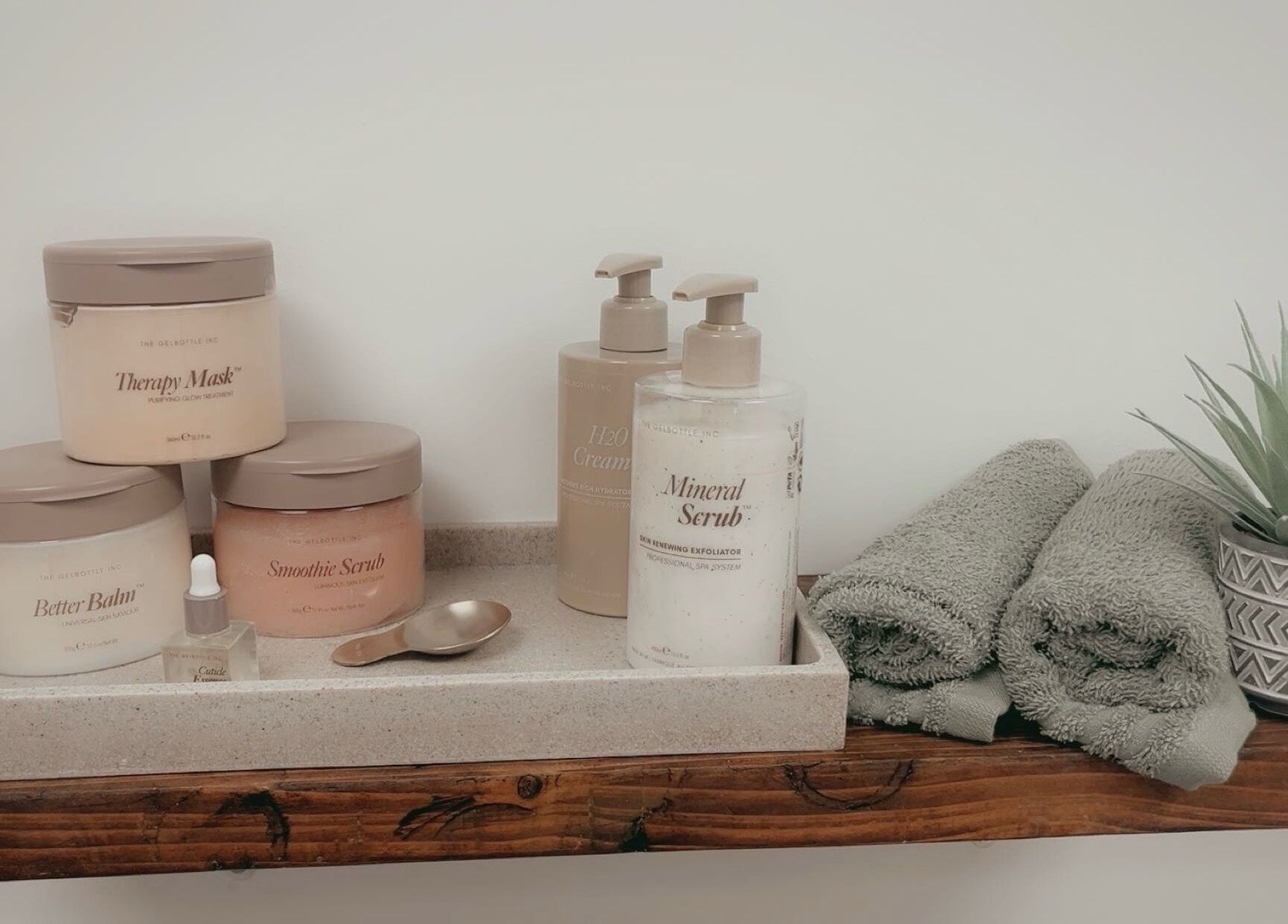 Relaxing spa products and towels at The Hive Beauty, Holistics & Hair in Cullompton, England, GB.