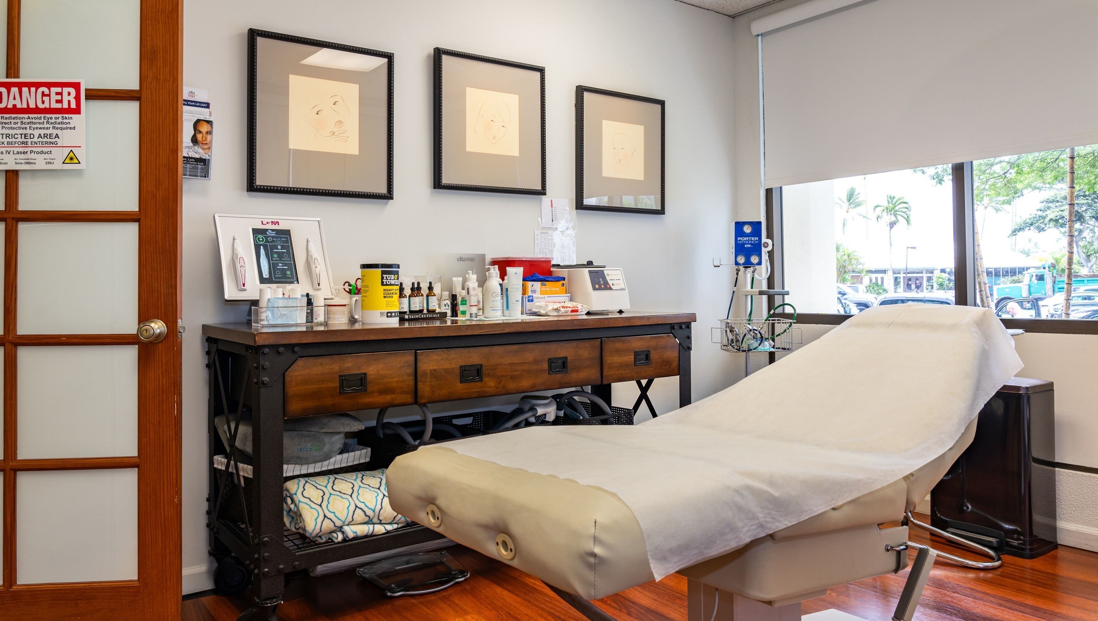 A serene treatment room at About Face Kailua in Kailua, Hawaii, US, featuring a comfortable spa bed.