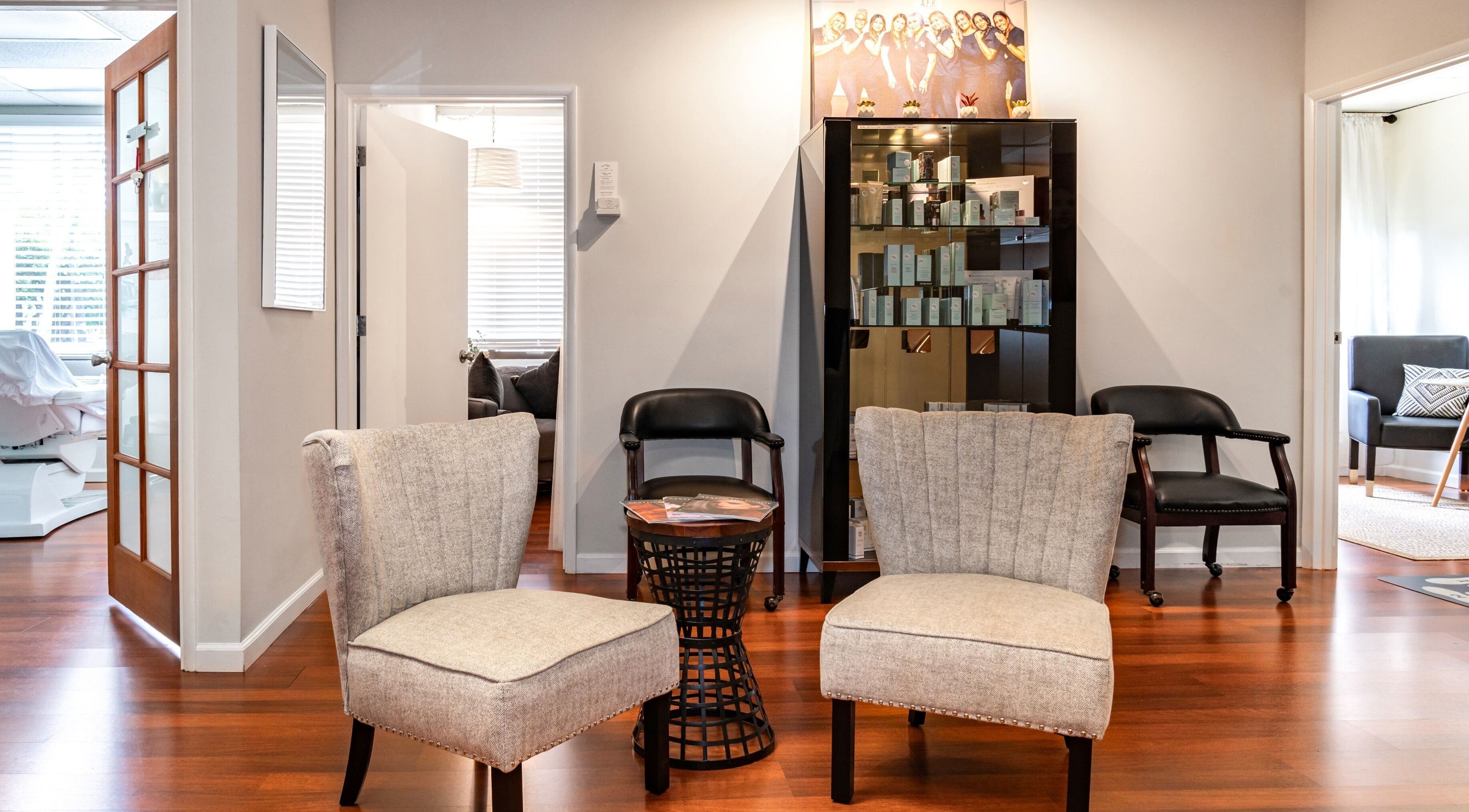 Comfortable seating area at Enhance Hawaii, Kailua, Hawaii, US, highlighting modern decor and welcoming ambiance.