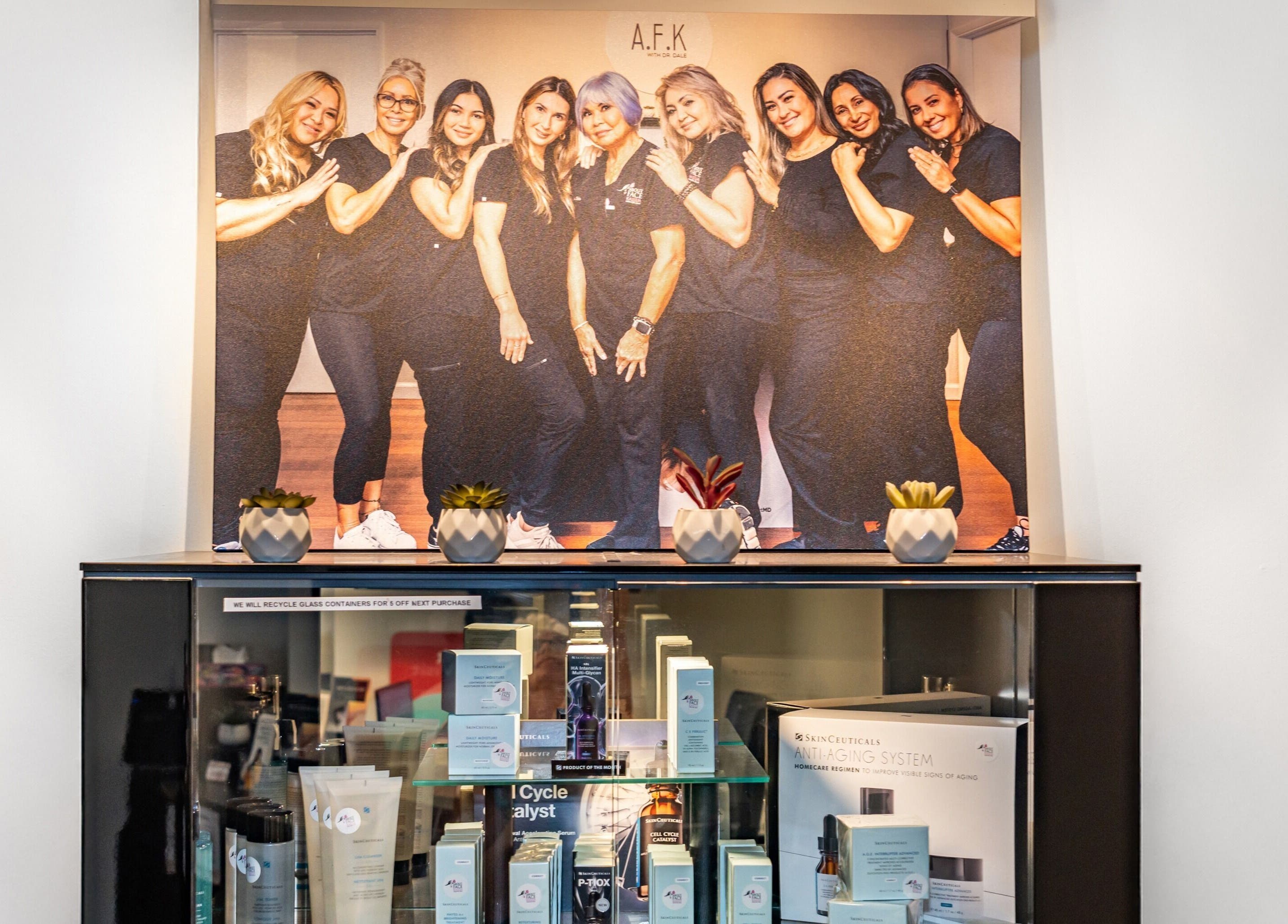 Enhance Hawaii team photo above skincare display in Kailua, Hawaii, US.