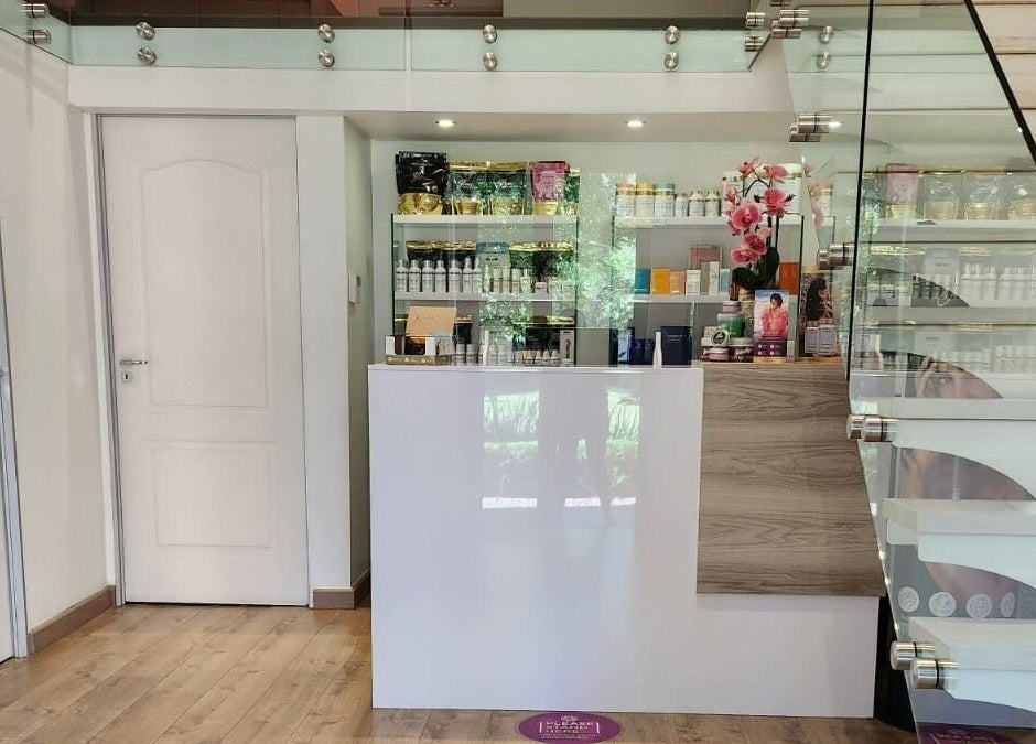 Elegant reception area at The Skin Revision Co, Centurion, Gauteng, ZA showcasing beauty products and modern design.
