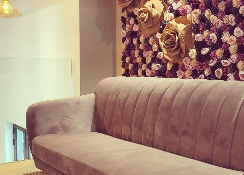 Elegant floral lounge at The Skin Revision Co, Centurion, Gauteng, ZA featuring plush seating.