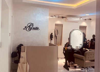 Interior of Ignite Beauty and Luxury Salon in Lagos, showcasing stylish decor and hair styling services.