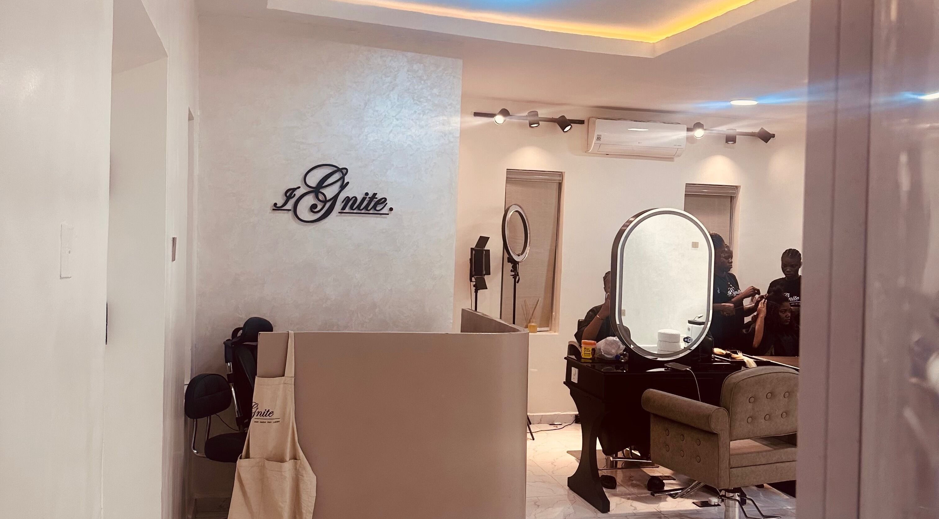Interior of Ignite Beauty and Luxury Salon in Lagos, showcasing stylish decor and hair styling services.