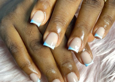 Stylish manicured nails at Ignite Beauty and Luxury Salon, Lagos, Lagos, NG, showcasing delicate design.