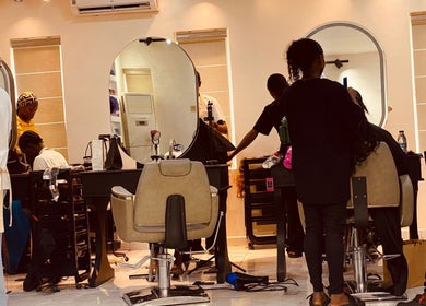 Stylists at Ignite Beauty and Luxury Salon in Lagos offer exceptional services in a sleek and modern space.