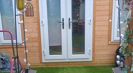 Charming entrance of Kent Professional Makeup and Therapies in Ryarsh, England, GB with decorative elements.