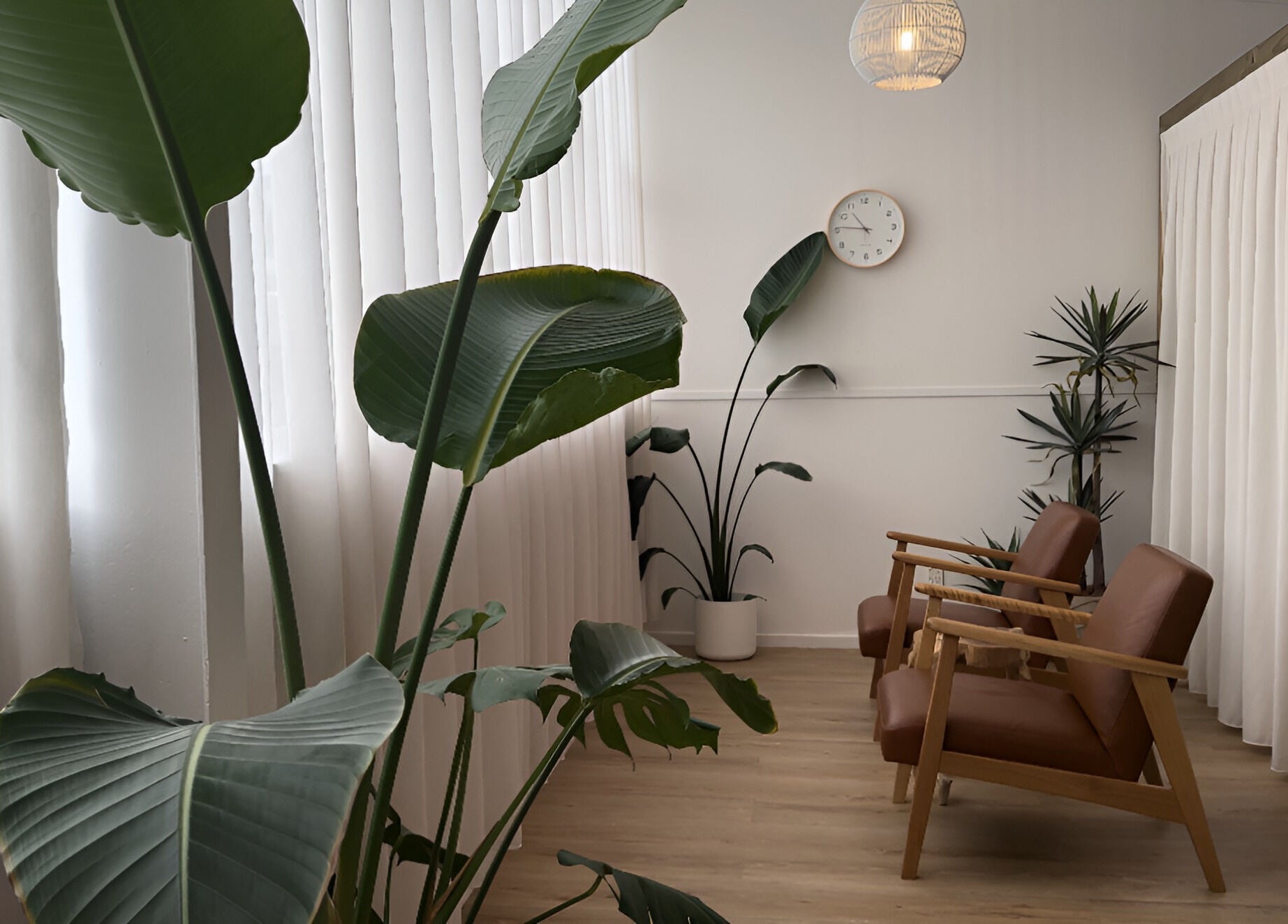 Relaxology Massage Takapuna offers a serene lounge with minimalist decor in Auckland, Auckland, NZ.