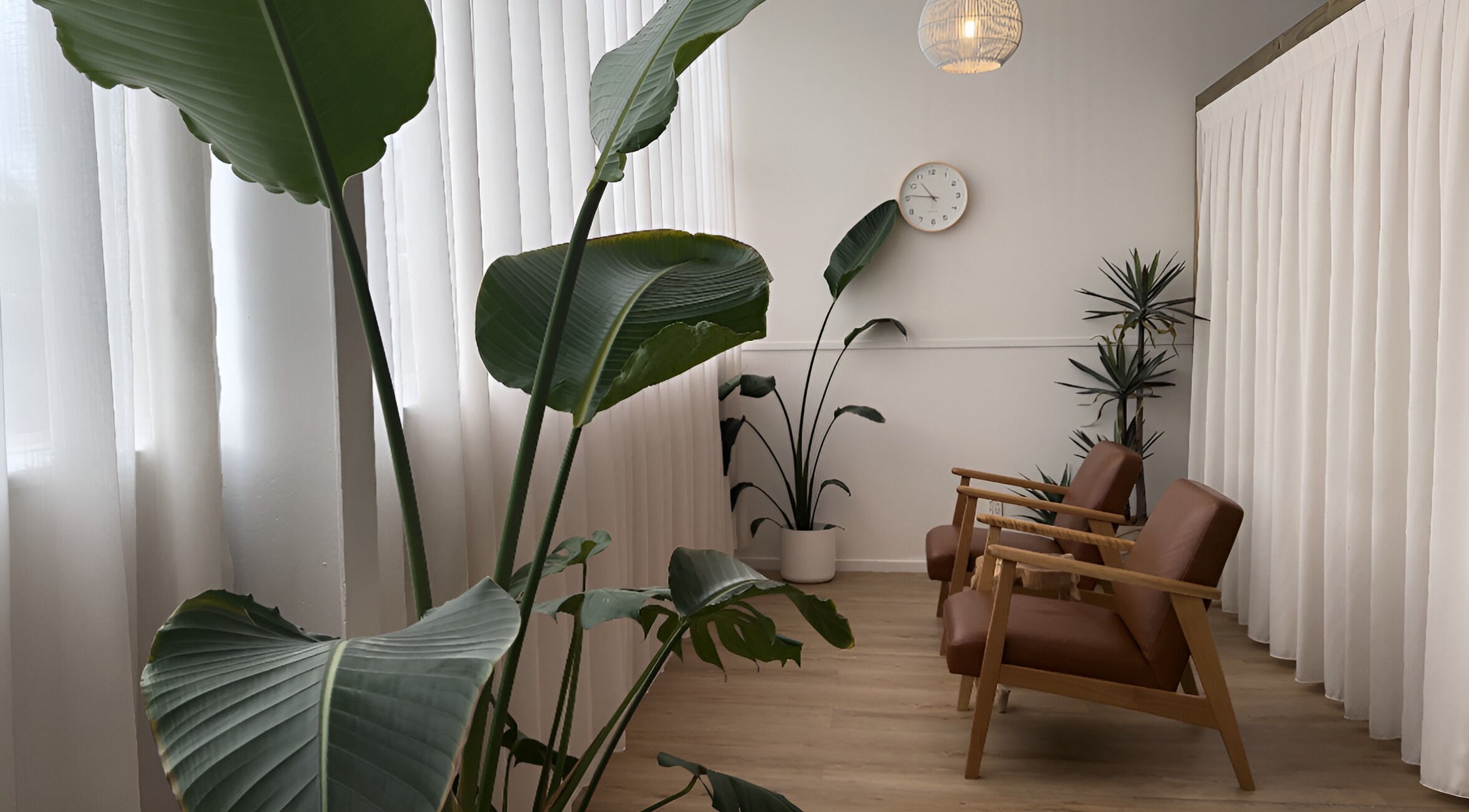 Relaxology Massage Takapuna offers a serene lounge with minimalist decor in Auckland, Auckland, NZ.