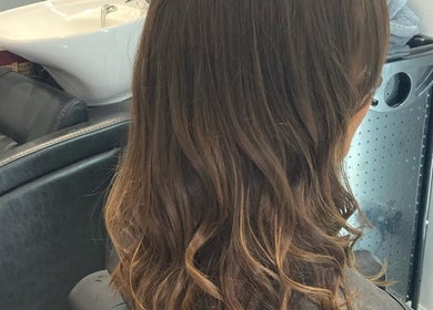 Elegant waves styled at Shellee at Salon 31, Hempstead, England, GB, showcasing expert hair care.
