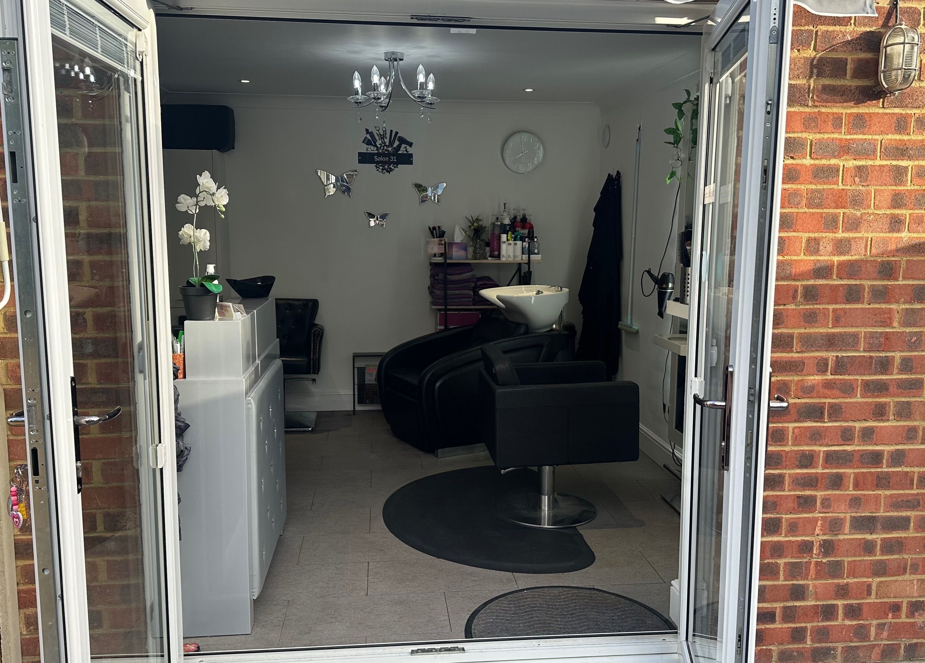 Chic interior of Shellee at Salon 31 in Hempstead, England, welcoming atmosphere with decor.