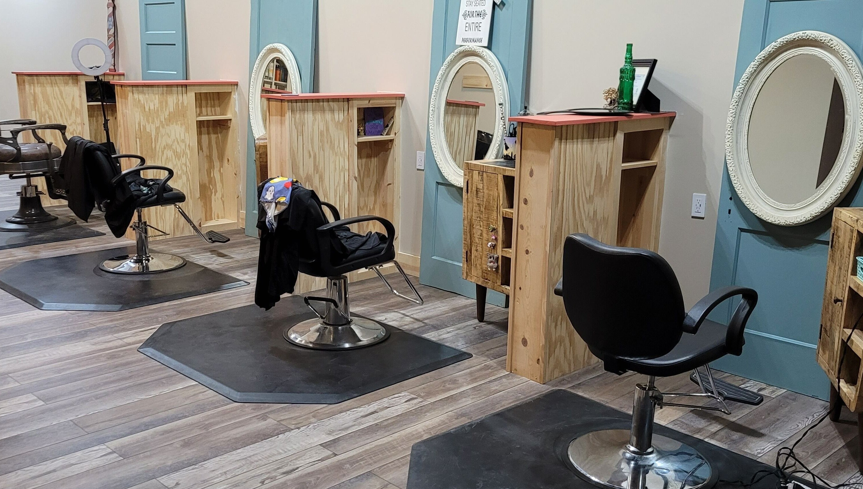 Modern salon chairs and mirrors at In the Spalight, Dickson, Tennessee, US, offering a relaxing beauty experience.