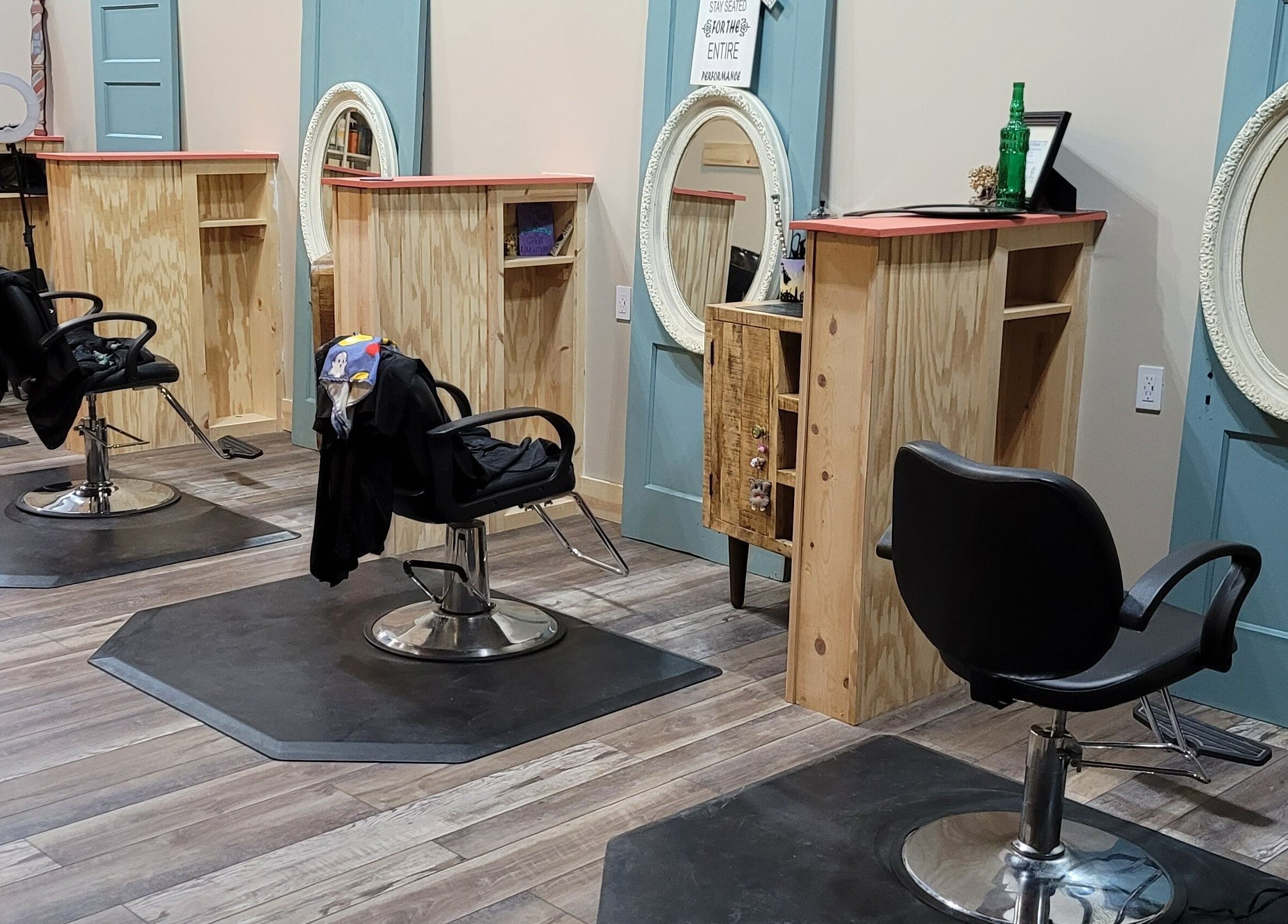 Modern salon chairs and mirrors at In the Spalight, Dickson, Tennessee, US, offering a relaxing beauty experience.