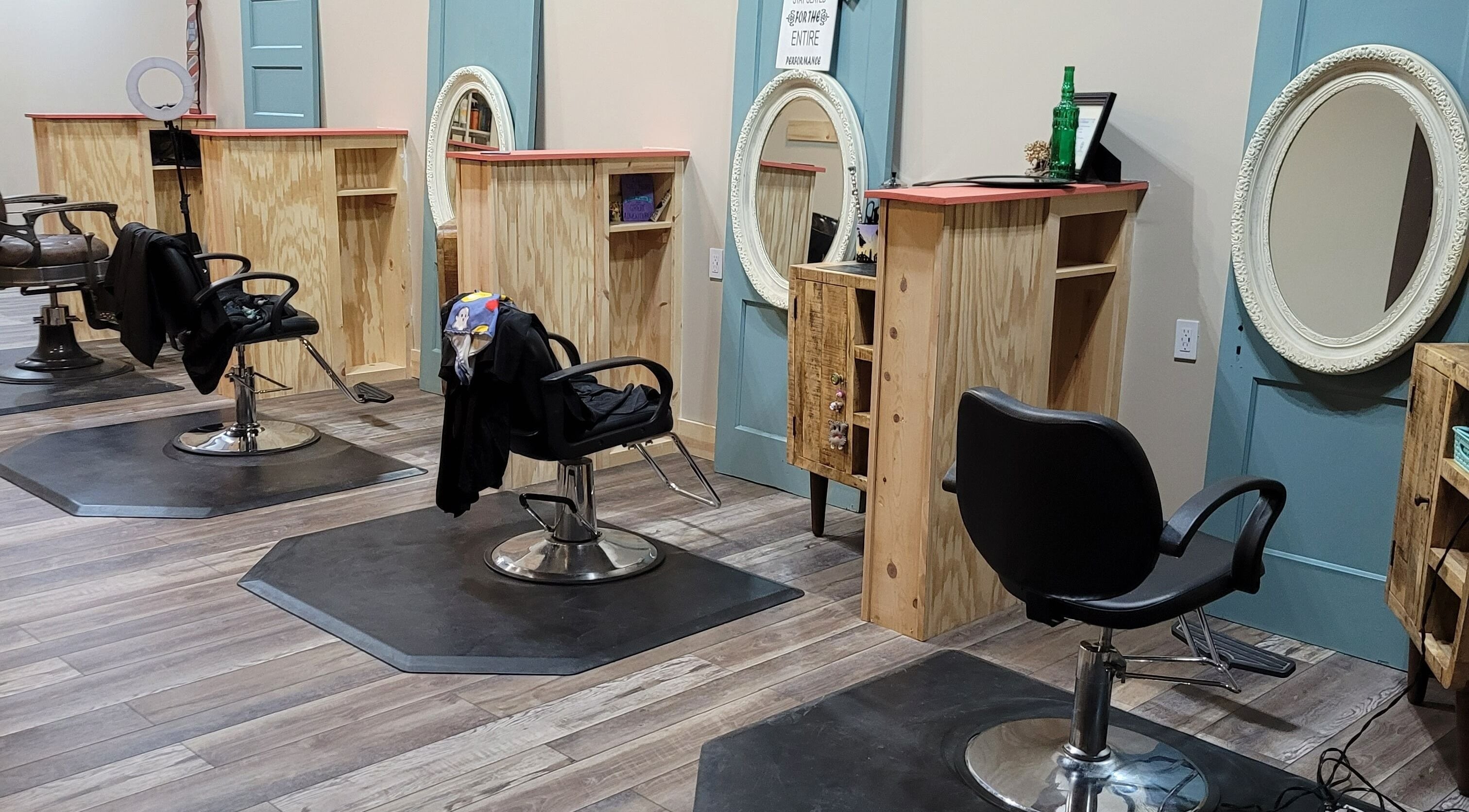 Modern salon chairs and mirrors at In the Spalight, Dickson, Tennessee, US, offering a relaxing beauty experience.
