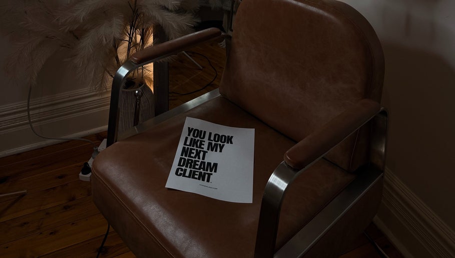 Elegant salon chair with motivational note at Xtendalash, Mascot, New South Wales, AU.