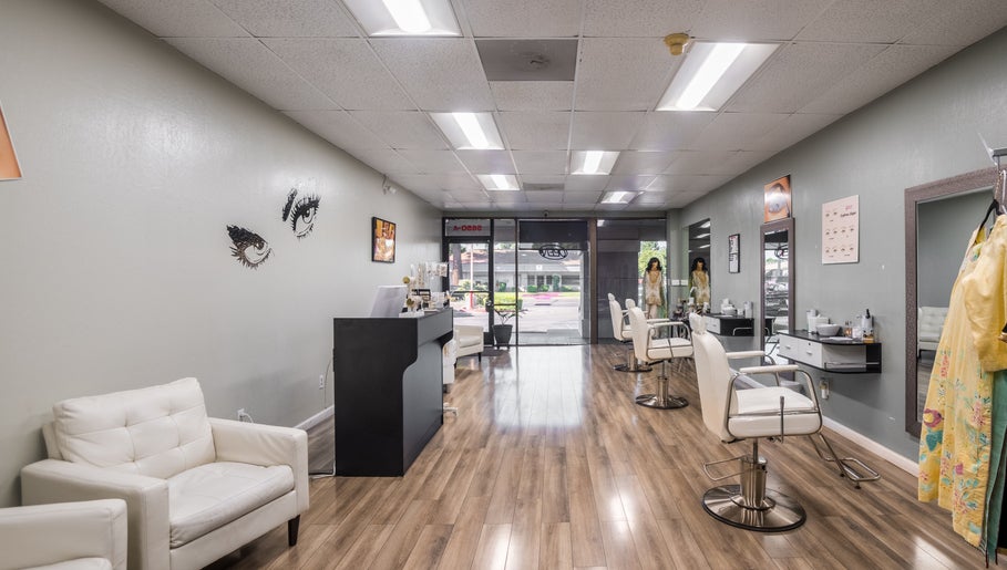 Modern interior of Eye Bar Beauty Salon in Stockton, California, US with sleek decor and cozy seating.