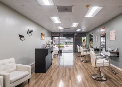 Modern interior of Eye Bar Beauty Salon in Stockton, California, US with sleek decor and cozy seating.