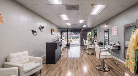 Modern interior of Eye Bar Beauty Salon in Stockton, California, US with chic styling chairs and decor.