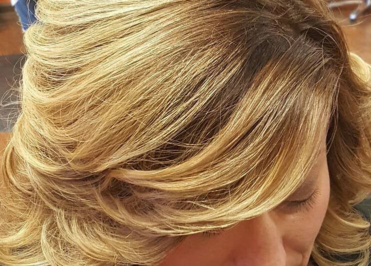 Styled golden hair at Rapha Holistic Well Spa, LLC, Clarksville, Tennessee, US.