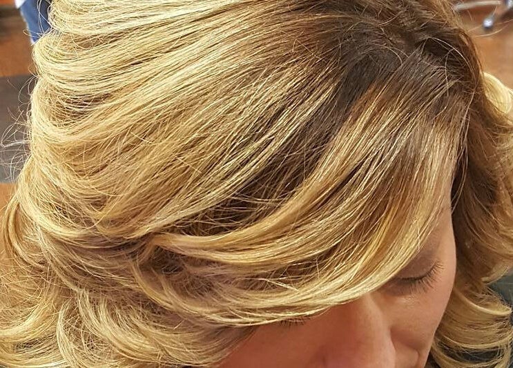 Styled golden hair at Rapha Holistic Well Spa, LLC, Clarksville, Tennessee, US.