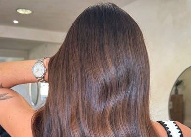 Beautiful shiny hair styled by Misha Greaves Hairstylist in Garstang, England, GB.