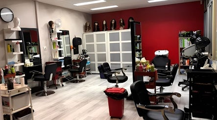 Interior of Afro Varieties Hair & Beauty in Penrith, NSW, AU featuring salon chairs and styling stations.