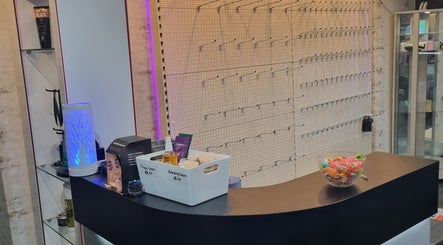 Reception area at Angel Wellness Centre Salon in Birtley, England, GB featuring a modern counter and products.