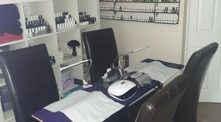 Nail care setup at Angel Wellness Centre Salon, Birtley, England, GB. Manicure station with nail polish racks.