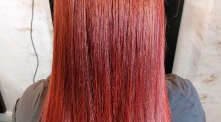 Vibrant red hair expertly styled at Angel Wellness Centre Salon in Birtley, England, GB.