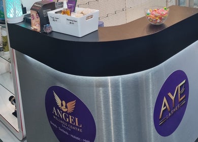 Stylish reception desk at Angel Wellness Centre Salon in Birtley, England, GB featuring modern decor.