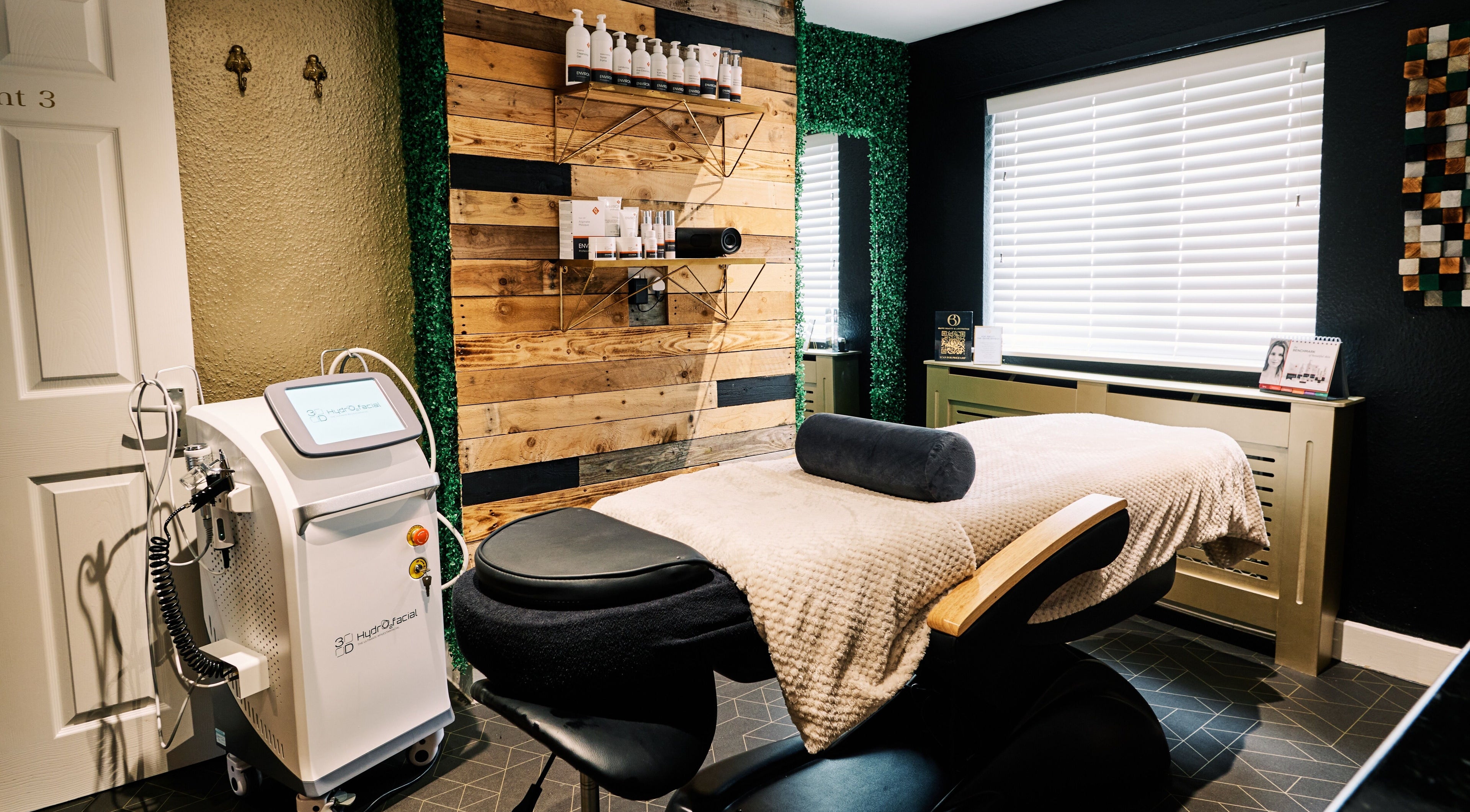 Relaxing treatment room at Olive Beauty & Aesthetics - Woburn Sands, Milton Keynes, England, featuring modern decor.