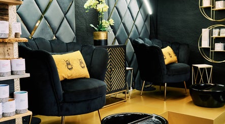 Chic interior at Olive Beauty & Aesthetics - Woburn Sands, Milton Keynes, England, GB, featuring plush seating.