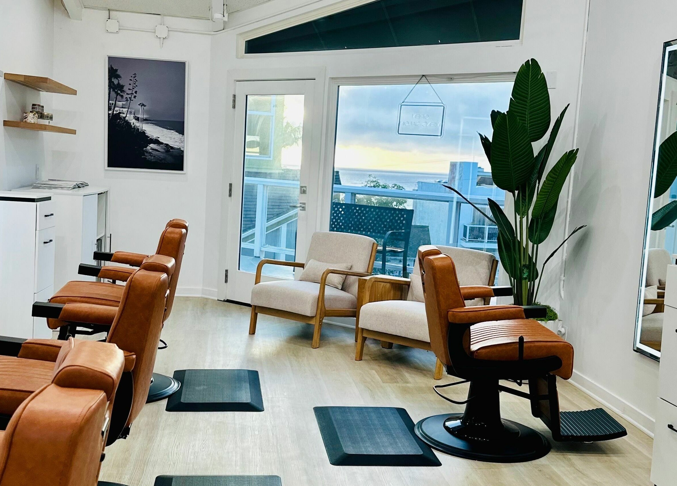 Elegant interior of IN STYLE Men's Salon Laguna Beach & Lake Forest in Laguna Beach, California, US with stylish decor.