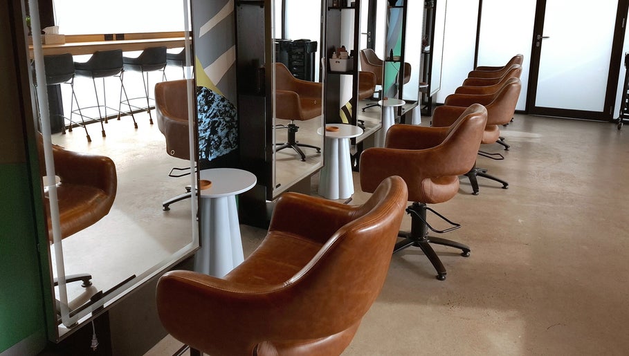Modern salon chairs at Lil Frenchie Hair at Saint Richards, Glebe, New South Wales, AU.
