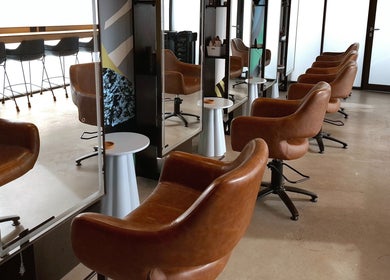 Modern salon chairs at Lil Frenchie Hair at Saint Richards, Glebe, New South Wales, AU.