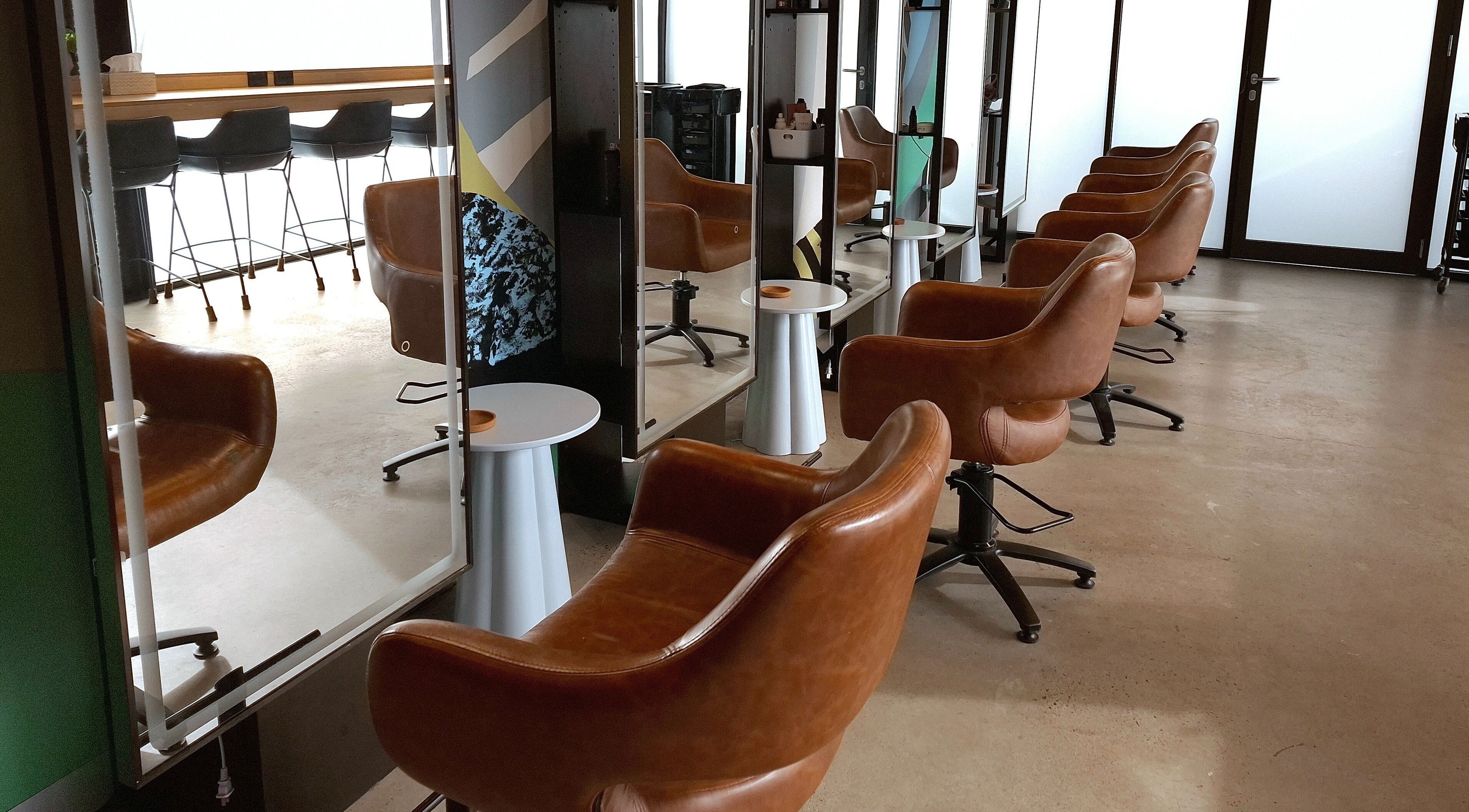Modern salon chairs at Lil Frenchie Hair at Saint Richards, Glebe, New South Wales, AU.