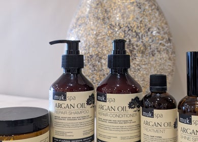 Luxurious hair care products at Colorbox Hair, Coomera, QLD, AU showcasing argan oil collection.