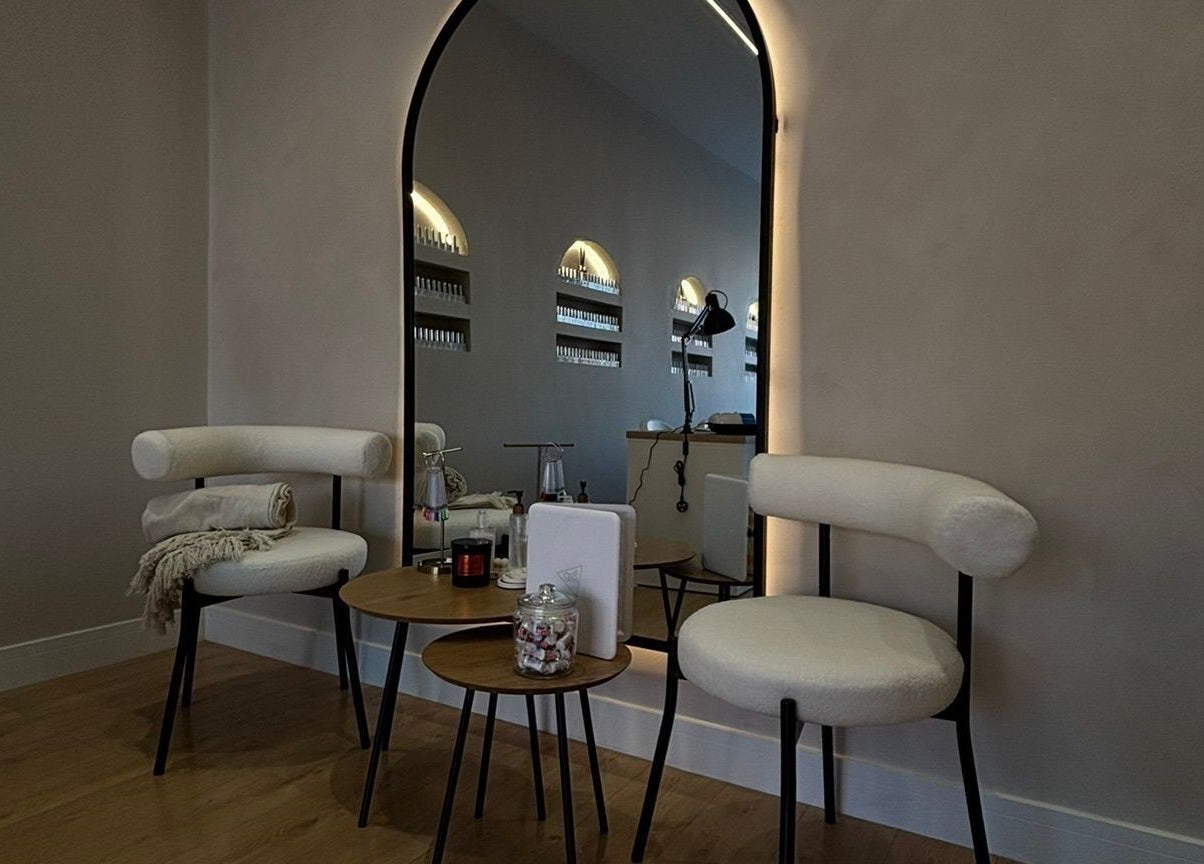 Cozy seating area at Oh so Tilly by That Nail Girl in UK, England, GB, featuring stylish chairs and refined decor.