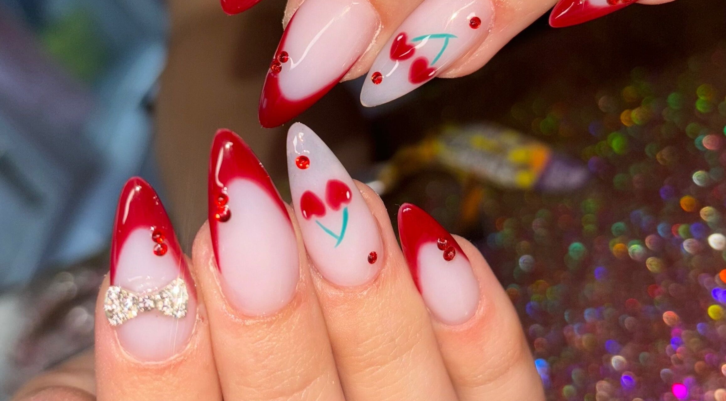 Elegant red-tipped nail art at Luxe Beauty MK, Crownhill, England, GB. Perfect for a sophisticated style.