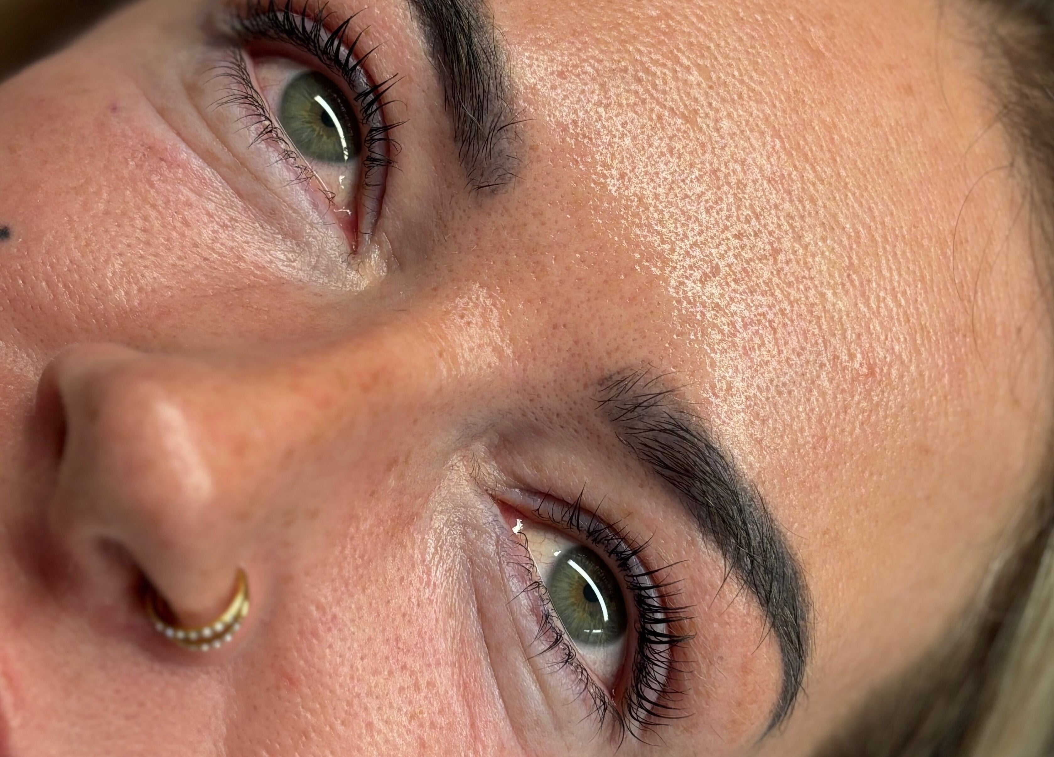 Close-up of enhanced eyebrows at Luxe Beauty MK, Crownhill, England, GB, showcasing natural beauty.