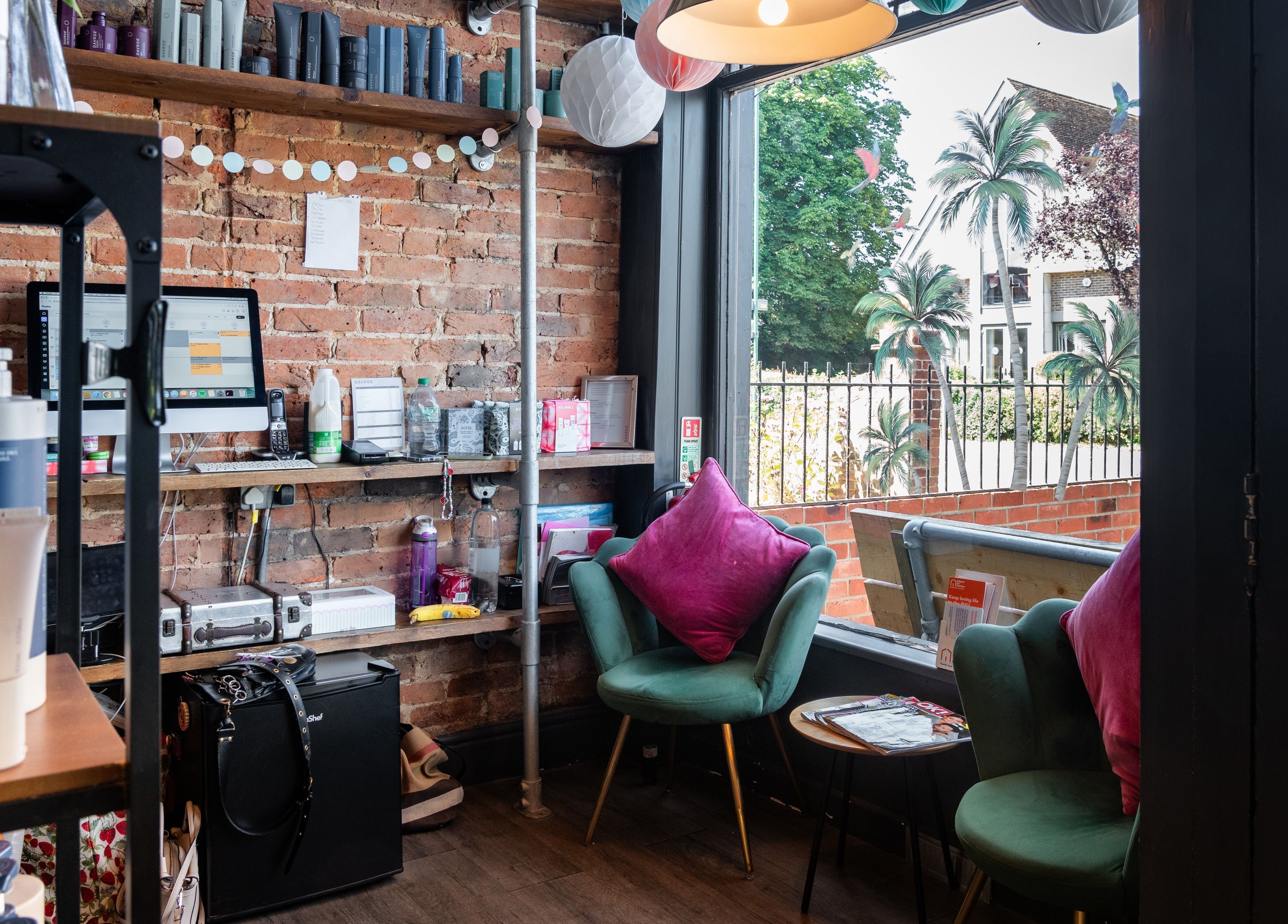 Relaxing seating area with products at Chandler & Hall, Southbourne, England, GB.