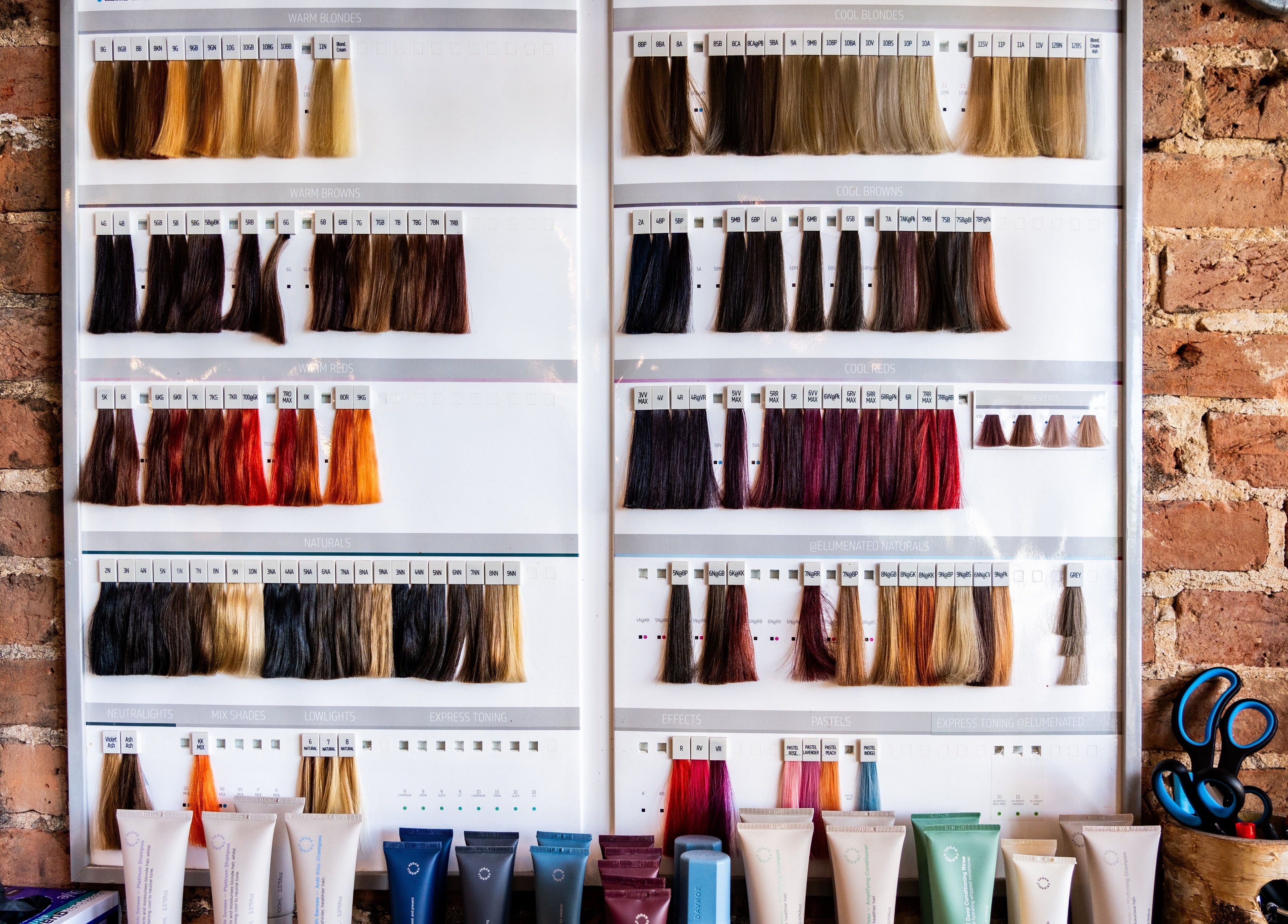 Diverse hair color samples at Chandler & Hall, Southbourne, England, GB, showcasing a vibrant spectrum.